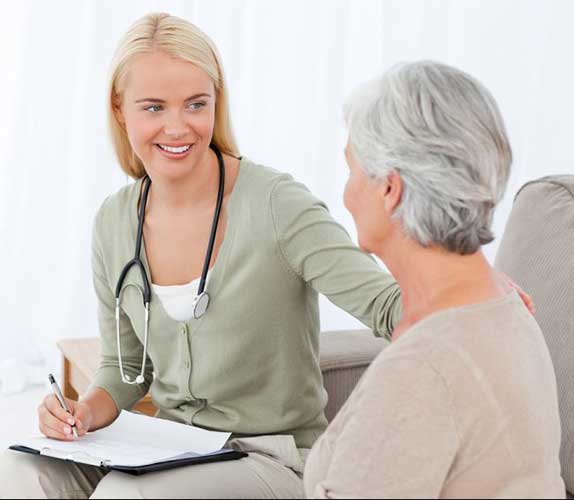 Female Doctor taking with patient