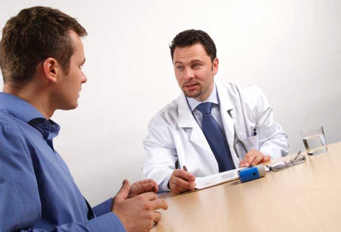 Doctor taking with patient