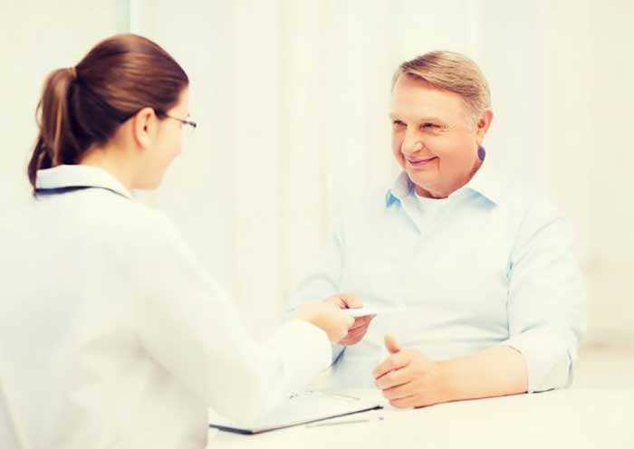 Female Doctor taking with patient