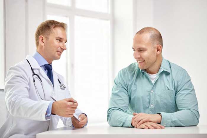 Doctor taking with patient