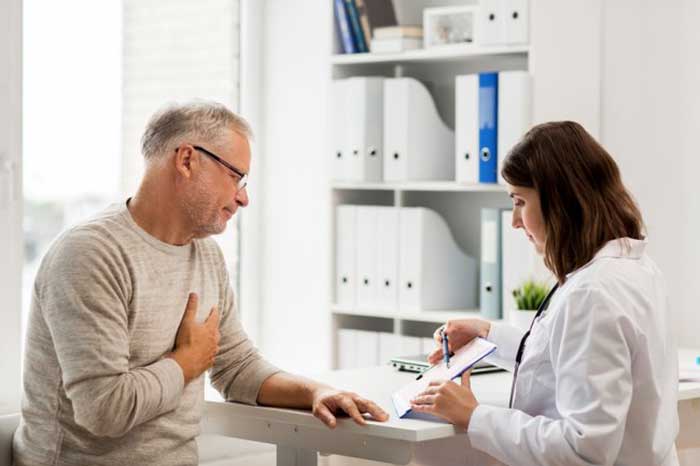 Doctor taking with patient