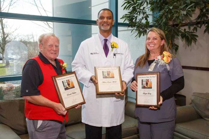 (Dr. Melvin Seard is the middle Physician in the photograph.)