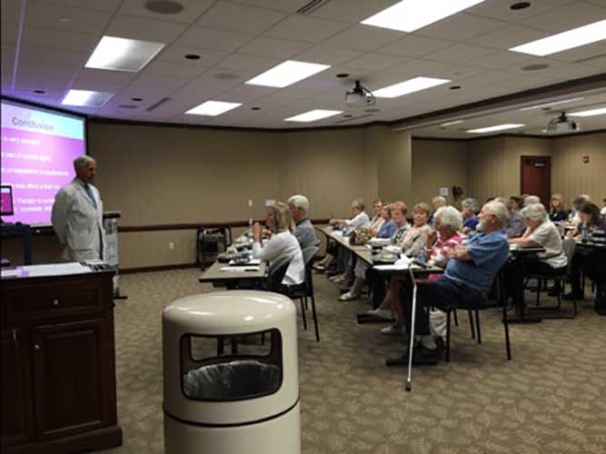 Dr. Joel Locke, Dr. William Tissot, and Alison Skidmore at Williamson Medical Center’s