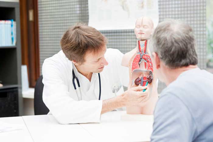 Doctor demonstrating to patient