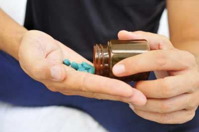 Man taking medicines