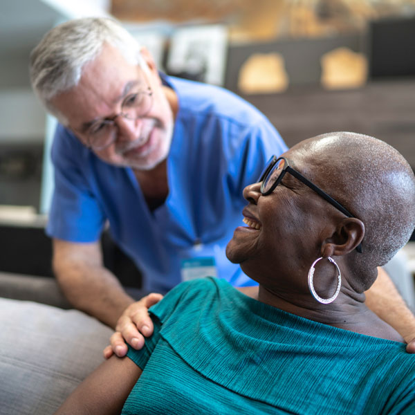 woman smiling with male nurse